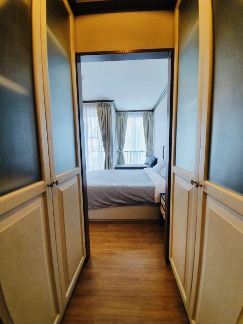 The Reserve - Kasemsan 3 มุมตู้เสื้อผ้า มุมเตียง.jpg